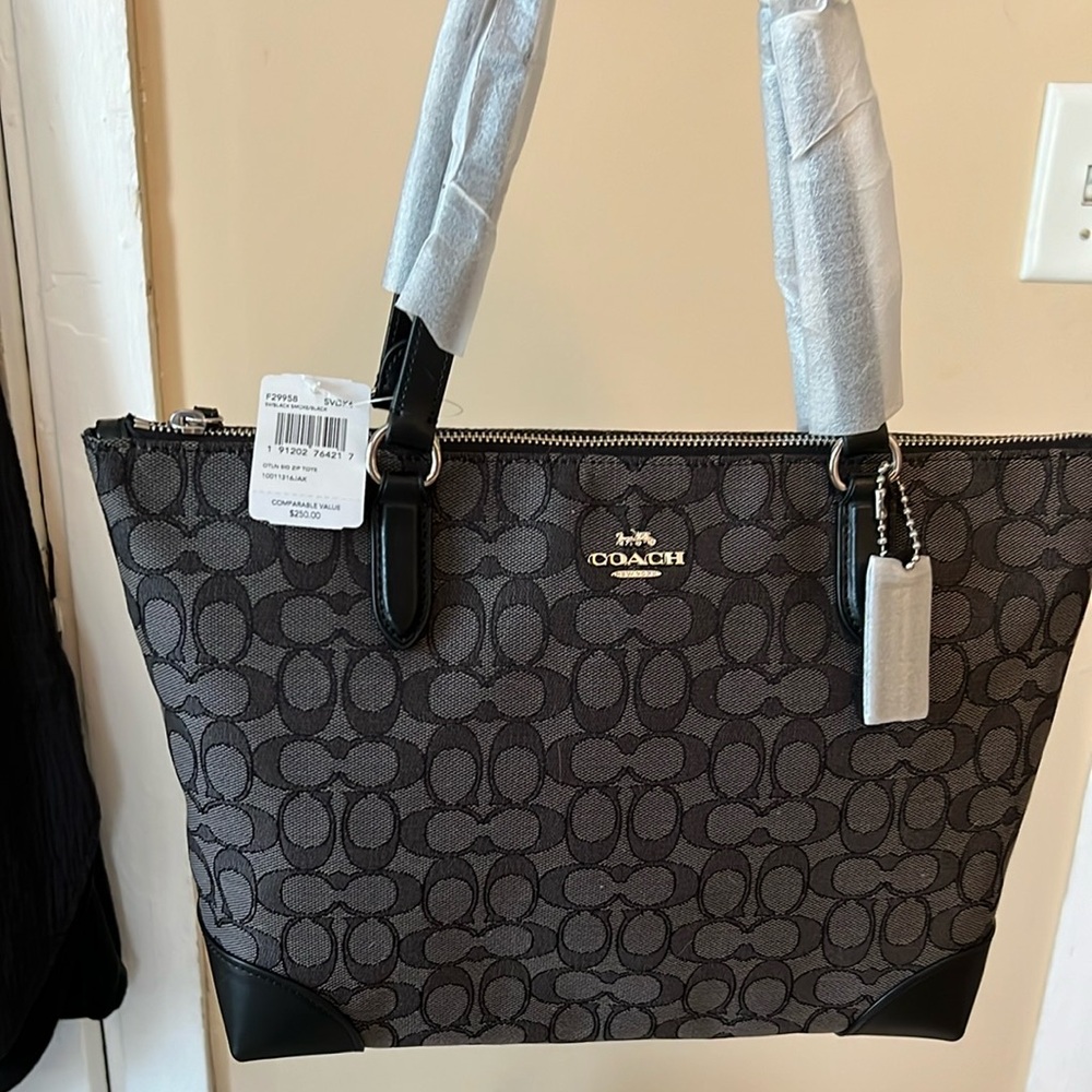 NWT Coach shoulder bag trimmed in black leather & straps